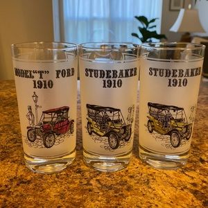 Vintage Ford Model T (1) & Studebaker (x2) drinking glasses. 51/2” tall.